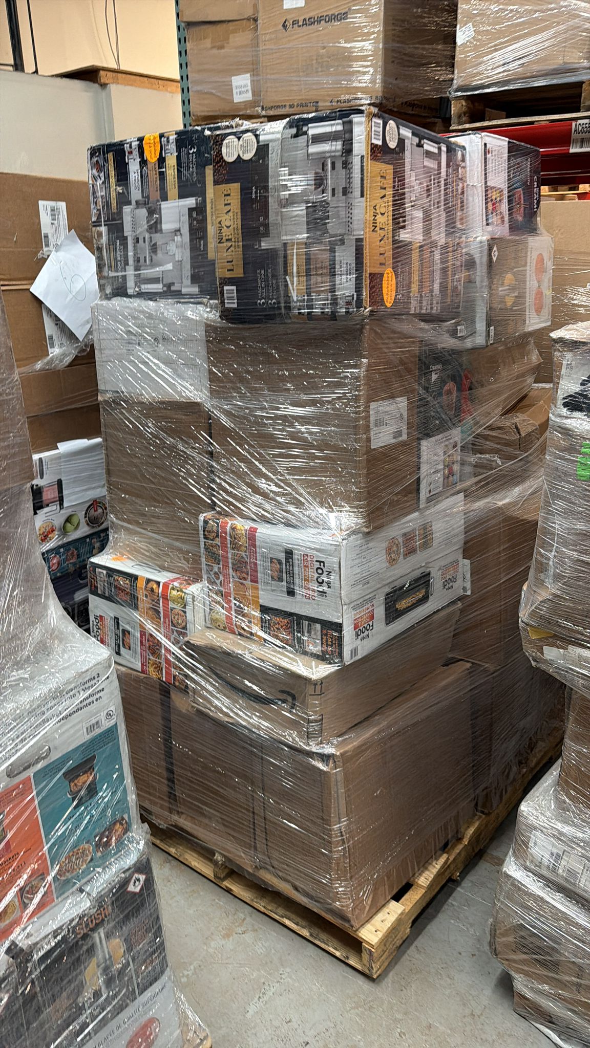 Electronics pallet wrapped in warehouse